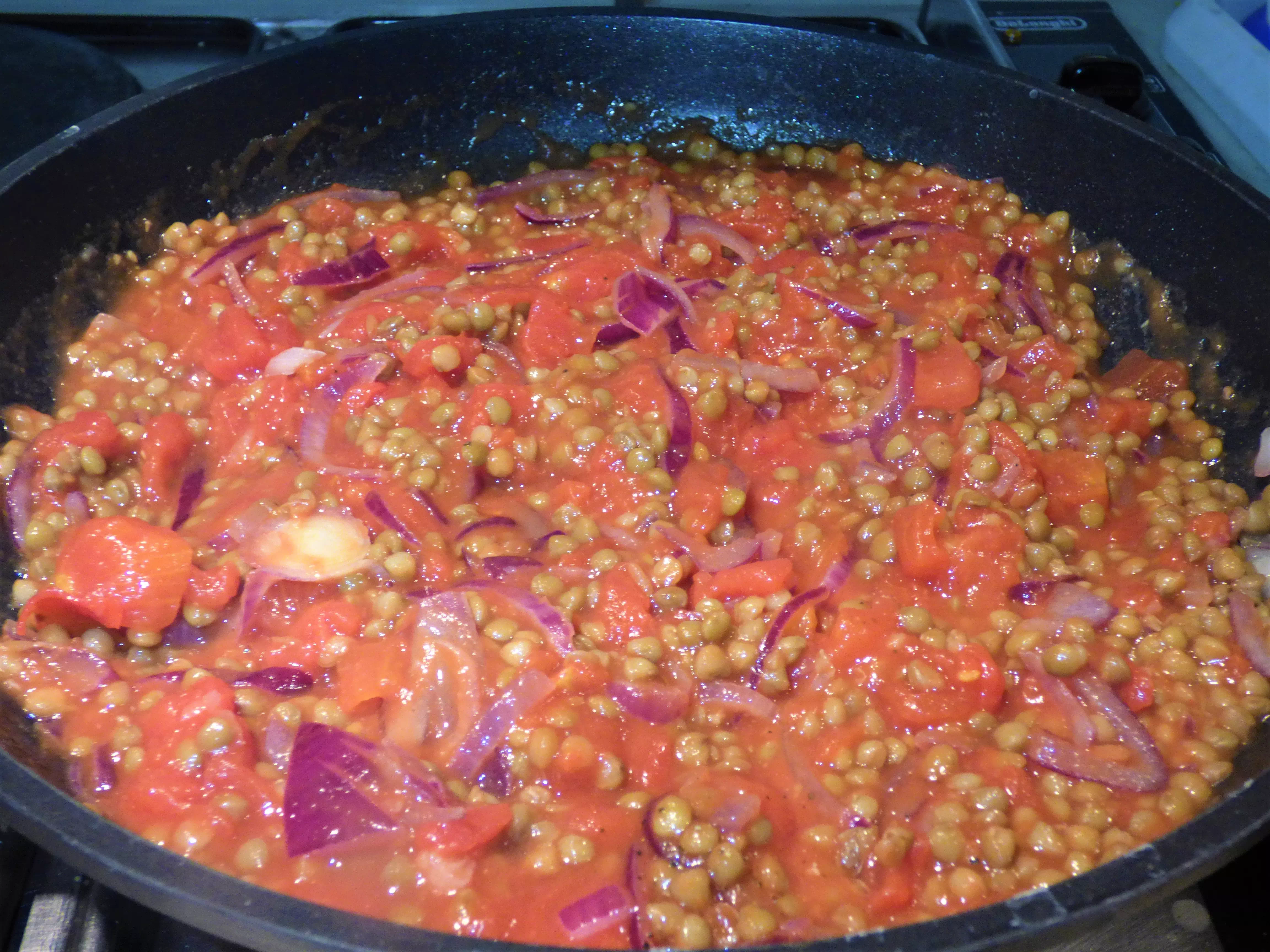 Foto polenta al ragù di lenticchie